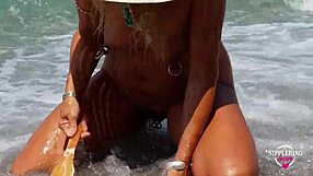 Nippleringlover flaunts extreme piercings on nude beach. Her stretched nipples shock everyone.