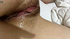 Close-up of a hairy wet pussy in ecstasy