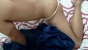 Muscular twink shows off his big package in the bedroom