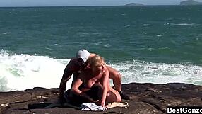 Beautiful blonde Tarra White enjoys an ocean threesome