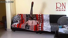 Hot secretary's solo striptease on the boss's sofa