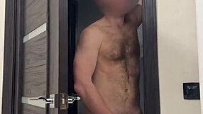 A man watches his wife have sex with another man