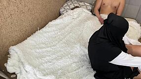 Home video of an Arab MILF wearing leggings while she masturbates
