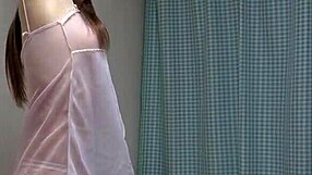 Japanese webcam show with a beautiful big-boobed girl dancing in transparent underclothes