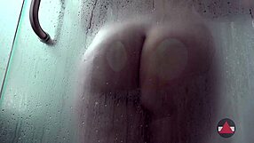 Steamy shower scene with a hot brunette solo performance