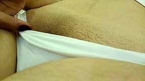 A beautiful Latina beauty pleases herself in this solo scene