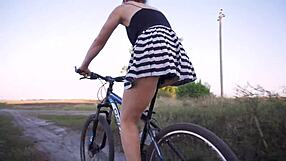 Hidden camera captures upskirt flaunting on a bike ride