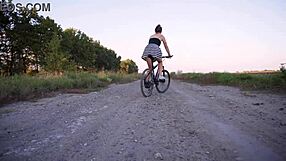 Hidden camera captures upskirt flaunting on a bike ride