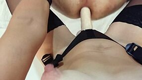A woman with small bosom dominates a man with a strapon in a femdom pegging scene