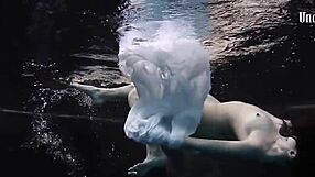Andrejka’s amazing underwater stunts in a bikini at the beach