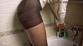 A sexy milf in control top pantyhose taking a shower