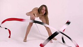 Kira Zukerman, the petite gymnast from Croatia strips and opens her legs for the camera