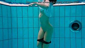 Hot young woman strips quickly to reveal her beautiful body