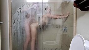 Amateur couple’s steamy hotel shower sex with doggy style action