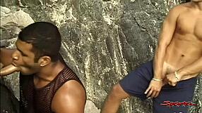 Gay threesome on the beach with hardcore action