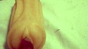 Fingered to orgasm with toy pussy