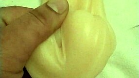 Fingered to orgasm with toy pussy