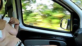 A real homemade video of a housewife showing off her tits while driving