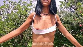 Wild hairy beauty flaunts big boobs in tight clothing in this video
