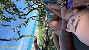 Latina's juicy pussy lips fingered hard in public at the beach