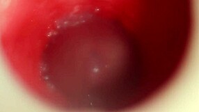 Close-up POV of a redheaded beauty's anal creampie show