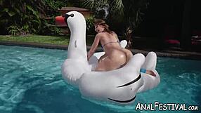Charley Hart's big ass and natural tits are well displayed in this anal scene by the pool
