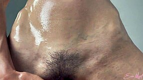 Oily babe expertly jerks big cock for cum-covered tits in pov