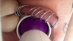 Hot woman with a pierced vagina using sex toys