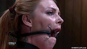 Shackled Gagged Slut in Red Stockings Endures Bizarre Bondage Pain