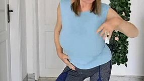 Hey, check out busty gilf MariaOlds doing her sporty strip dance!