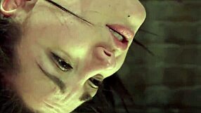 The guy was locked in a cage and the girl's mouth was taken by force