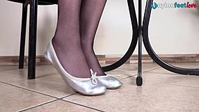 Leggy brunette in pantyhose and perfect ballet flats shoeplay