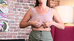 Alisha Adams models various outfits and tapes her boobs for us.