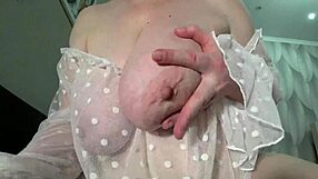 Wow, check out this gorgeous milf with big boobs and saggy tits up close!