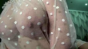 Wow, check out this gorgeous milf with big boobs and saggy tits up close!