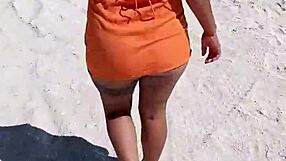Yo, check this Mexican whore showing off her tits and ass. She’s getting groped on a public beach in Mexico!