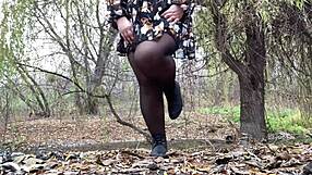 mother-in-law pees doggystyle in a flirty summer dress while bent over outdoors