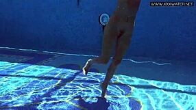 Russian pornstar Mary Kalisy strips off her bikini for a nude underwater swim in the pool