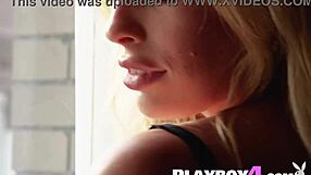 Blonde Canadian babe Katie Jean slowly reveals her tempting body in sleek black lingerie